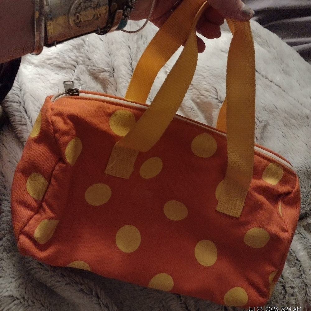 Preowned yellow and orange polka dot makeup bag